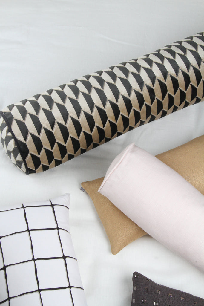 2 bolster pillows on a couch | The Pillow Collection